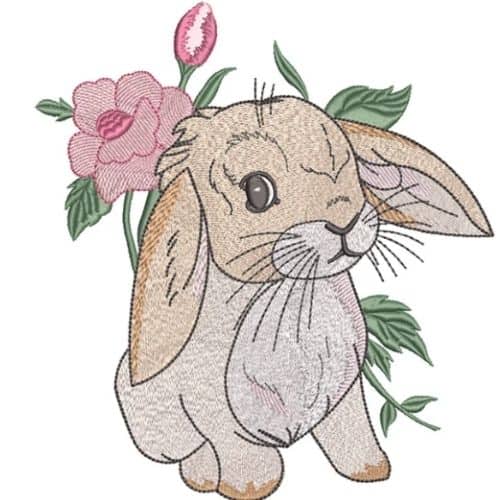 Easter Bunny with flowers machine embroidery design by Canada Embroidery designs on Etsy part of round up post on easyonthetongue.com  Cute Easter Machine Embroidery Designs (Free and Etsy)